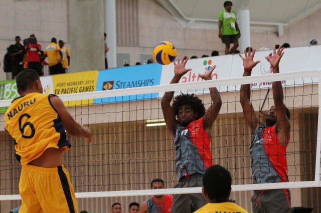 Silas Dame (6) spikes in Nauru's men's volleyball 3-0 loss against New Caledonia. Photo by Vere Freeman.