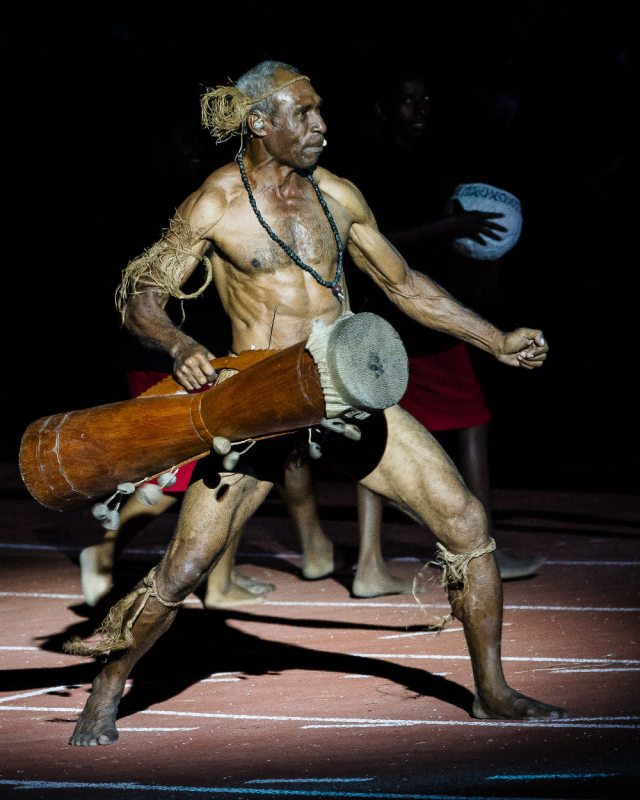Drum solo: A performer strikes a pose at the opening ceremony. Photo by Dave Buller.